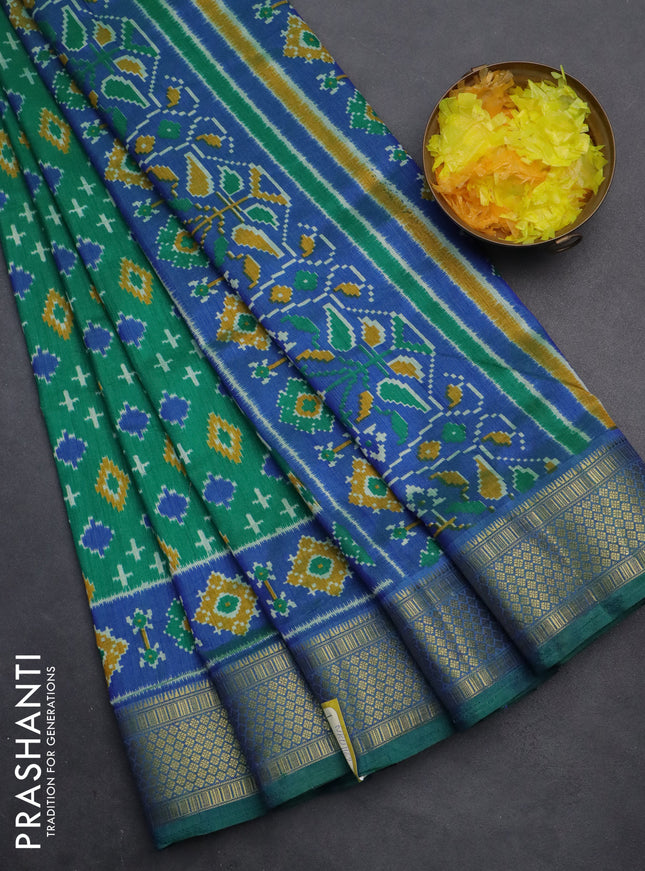 Semi tussar saree green and blue with allover ikat prints and zari woven border