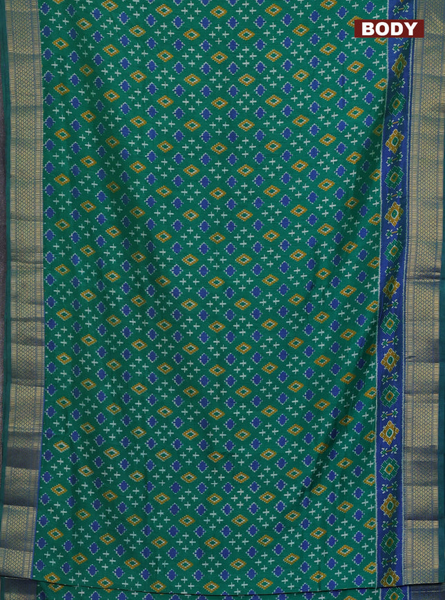 Semi tussar saree green and blue with allover ikat prints and zari woven border