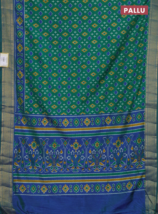 Semi tussar saree green and blue with allover ikat prints and zari woven border