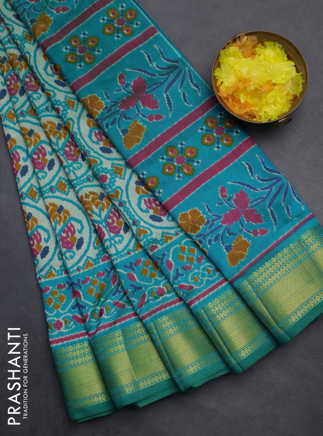 Semi tussar saree teal blue and beige with allover ikat prints and zari woven border