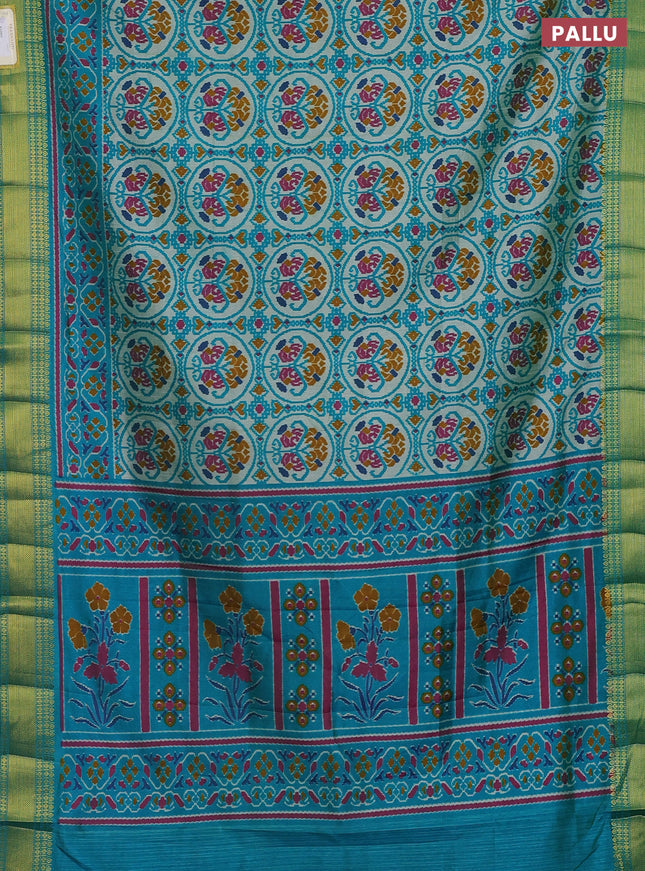 Semi tussar saree teal blue and beige with allover ikat prints and zari woven border