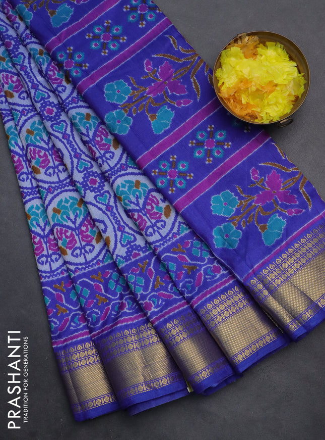 Semi tussar saree blue and grey with allover ikat prints and zari woven border