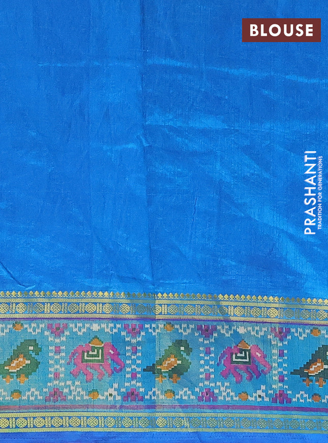 Semi tussar saree dual shade of dark blue and blue with allover ikat prints and zari woven border