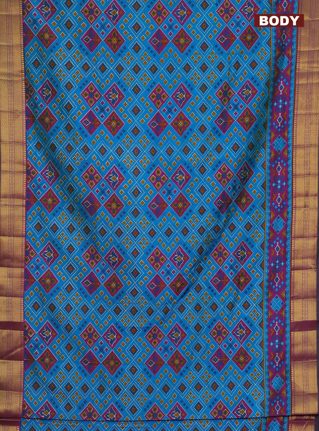 Semi tussar saree cs blue and dark magenta pink with allover ikat prints and zari woven border