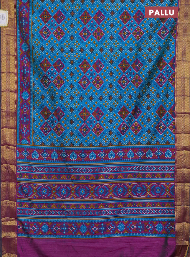 Semi tussar saree cs blue and dark magenta pink with allover ikat prints and zari woven border