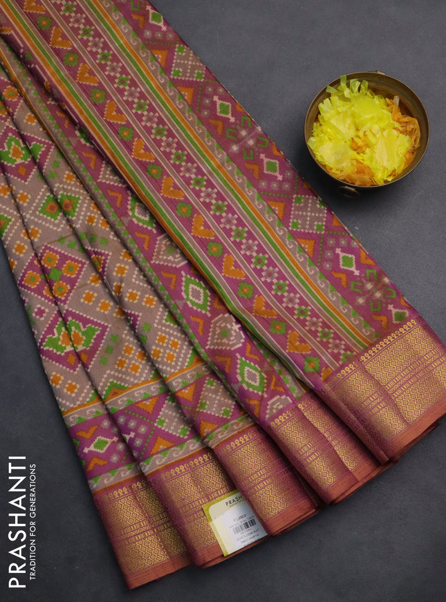 Semi tussar saree brown and magenta pink with allover ikat prints and zari woven border