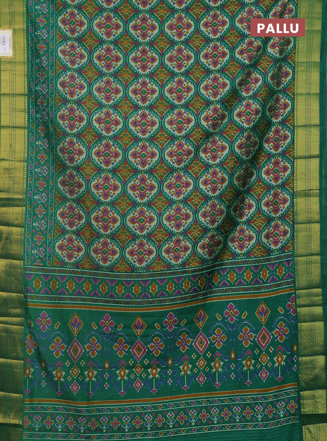 Semi tussar saree green with allover ikat prints and zari woven border