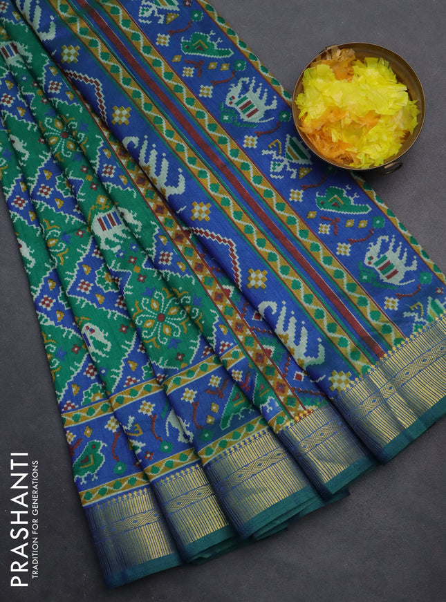 Semi tussar saree green and blue with allover ikat prints and zari woven border