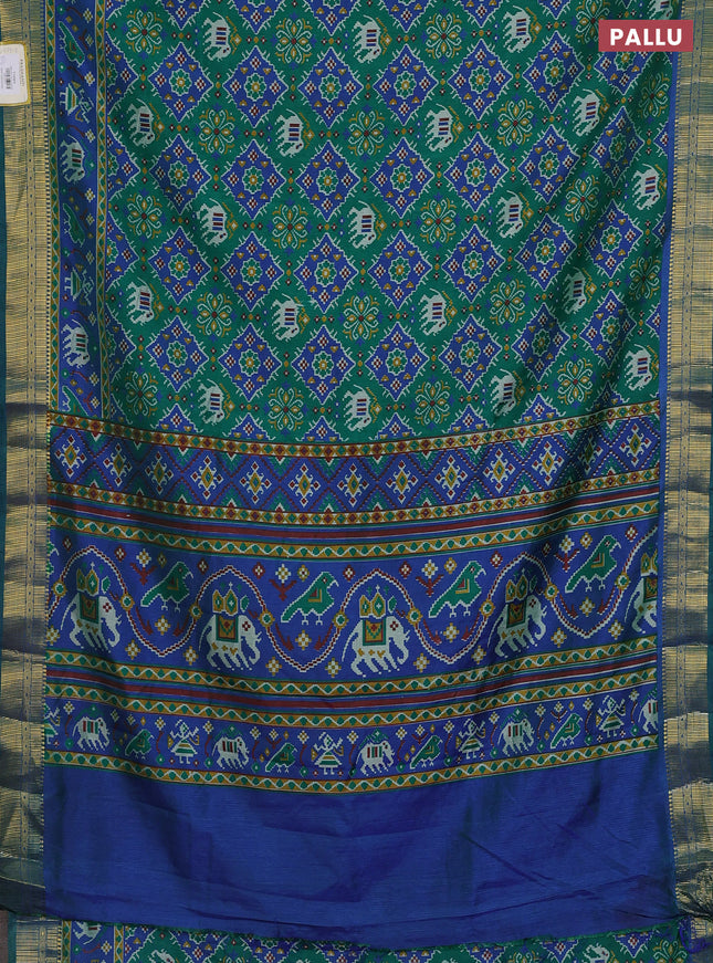Semi tussar saree green and blue with allover ikat prints and zari woven border
