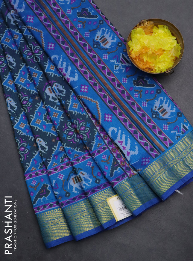 Semi tussar saree dual shade of bluish green and cs blue with allover ikat prints and zari woven border