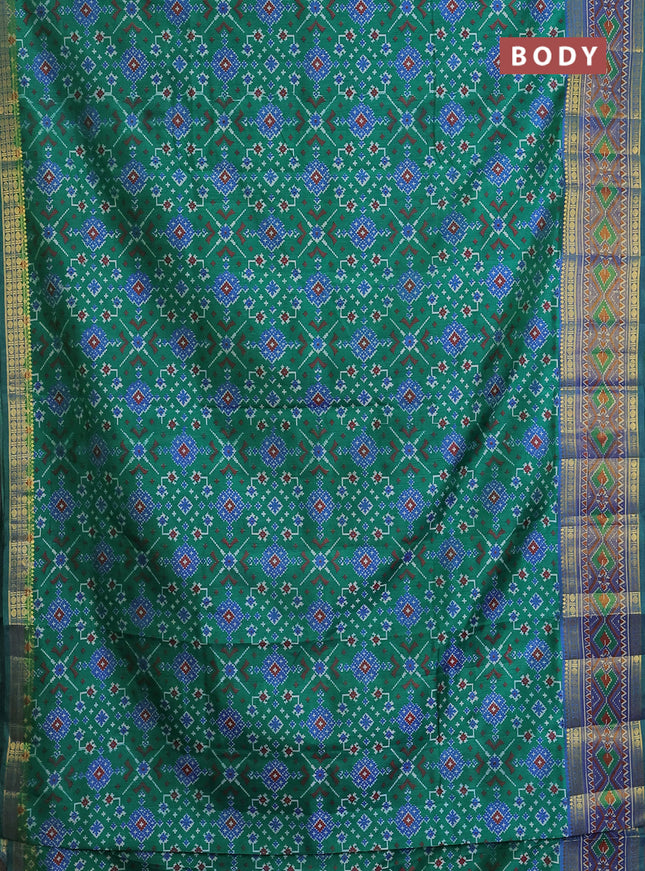 Semi tussar saree green and blue with allover ikat prints and zari woven border