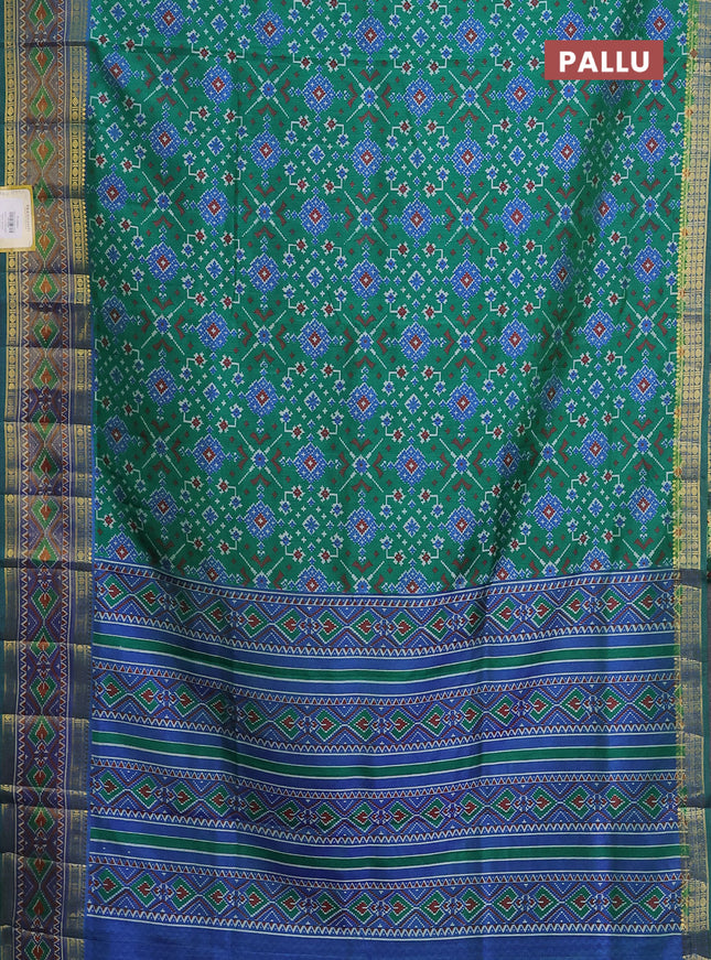 Semi tussar saree green and blue with allover ikat prints and zari woven border