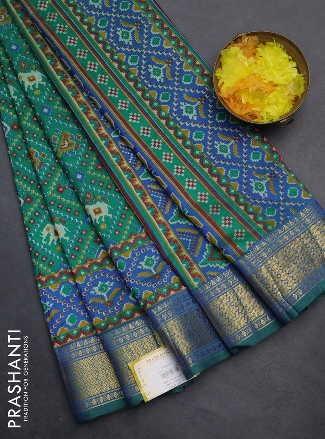 Semi tussar saree dual shade of blue and dual shade of green with allover ikat prints and zari woven border