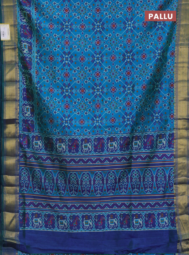 Semi tussar saree cs blue and green with allover ikat prints and zari woven border