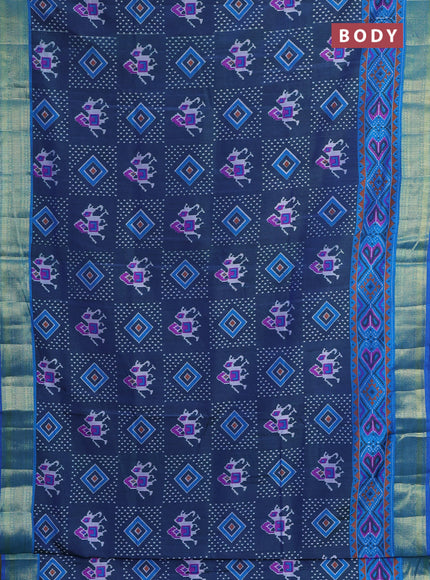 Semi tussar saree dual shade of bluish green and blue with allover ikat prints and zari woven border