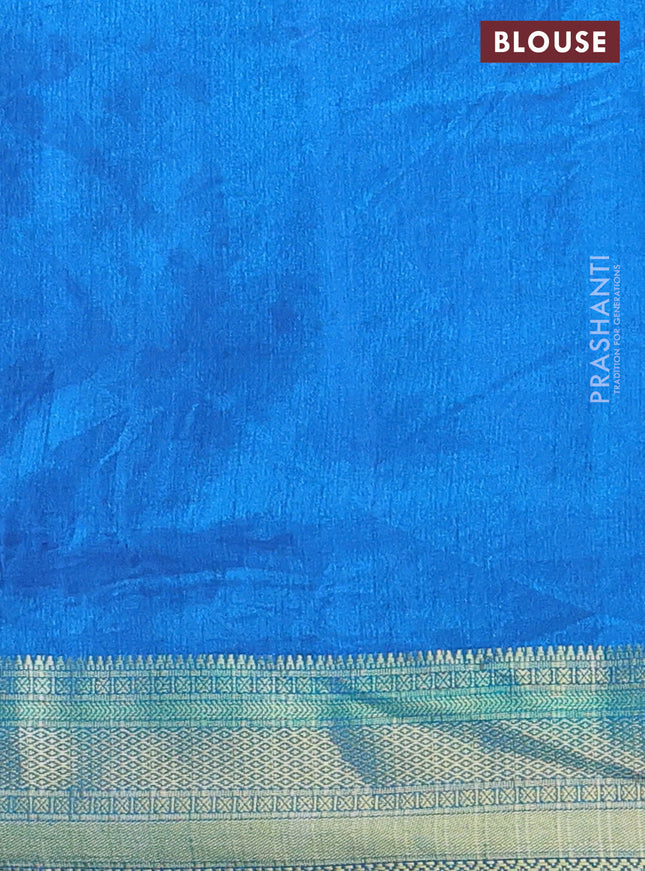 Semi tussar saree dual shade of bluish green and blue with allover ikat prints and zari woven border