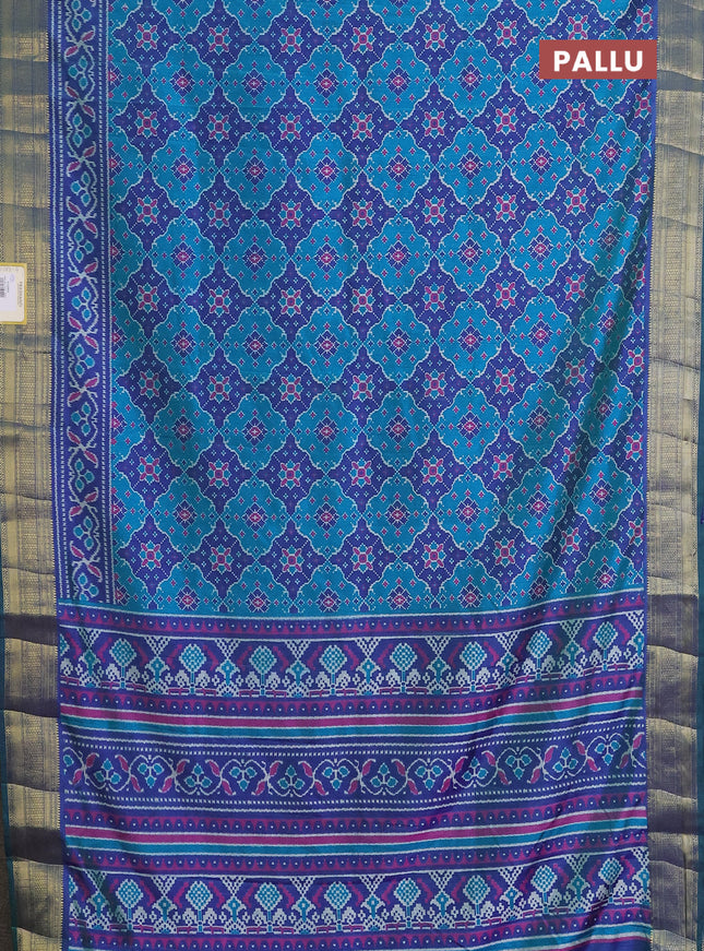 Semi tussar saree teal blue and blue with allover ikat prints and zari woven border