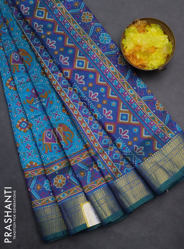 Semi tussar saree cs blue and dark blue with allover ikat prints and zari woven border