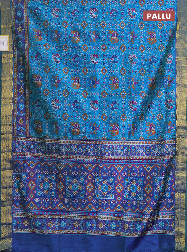 Semi tussar saree cs blue and dark blue with allover ikat prints and zari woven border