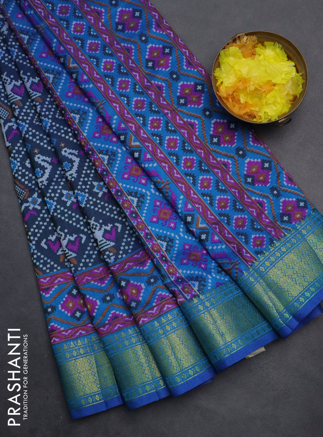 Semi tussar saree dual shade of bluish green and cs blue with allover ikat prints and zari woven border