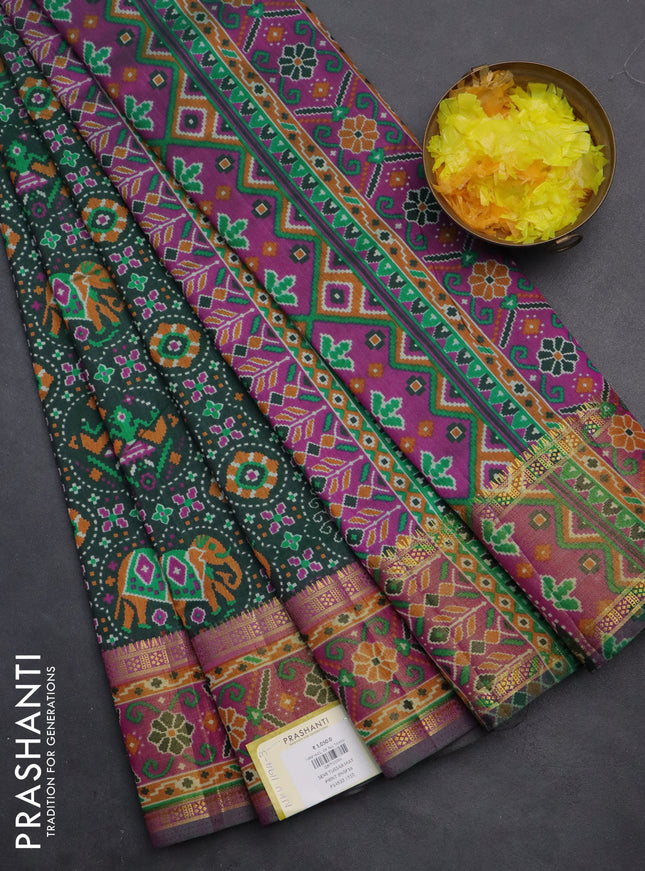 Semi tussar saree dark green and purple with allover ikat prints and zari woven border
