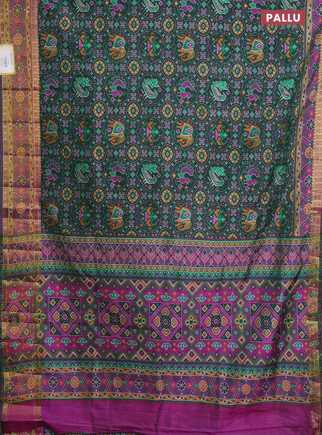 Semi tussar saree dark green and purple with allover ikat prints and zari woven border