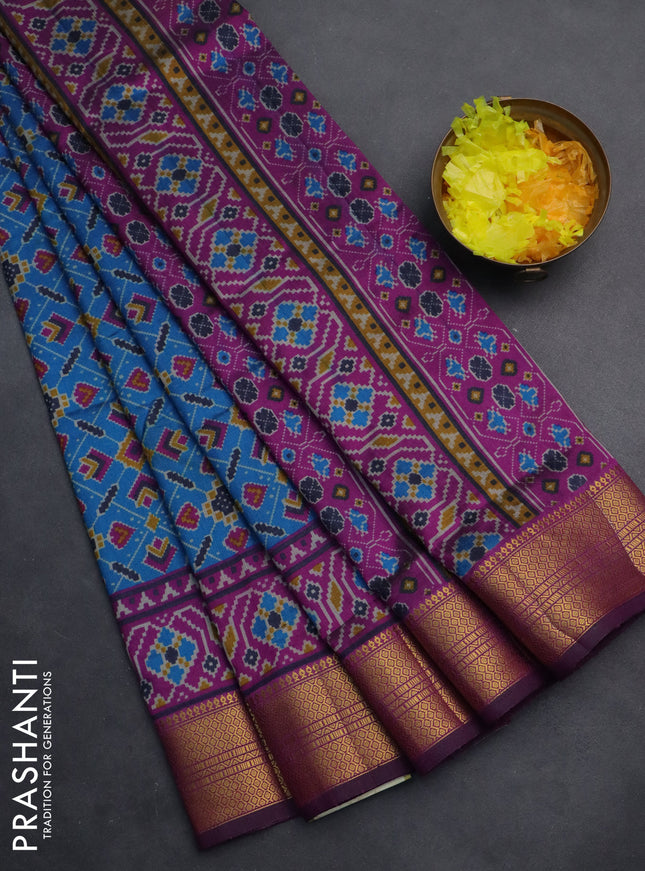 Semi tussar saree cs blue and purple with allover ikat prints and zari woven border