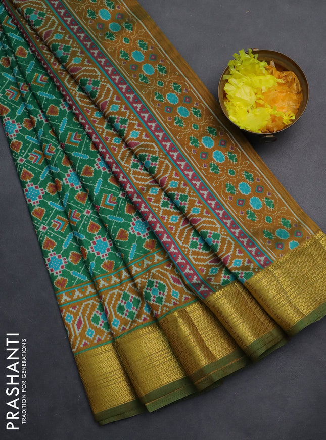 Semi tussar saree green and mustard shade with allover ikat prints and zari woven border