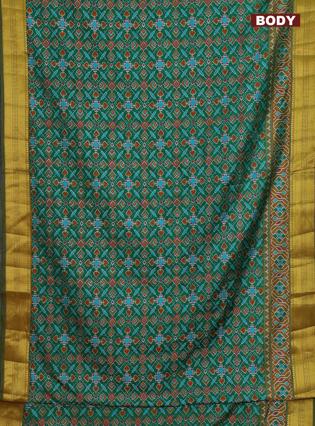 Semi tussar saree green and mustard shade with allover ikat prints and zari woven border