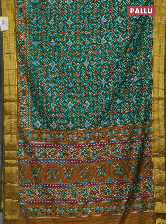 Semi tussar saree green and mustard shade with allover ikat prints and zari woven border