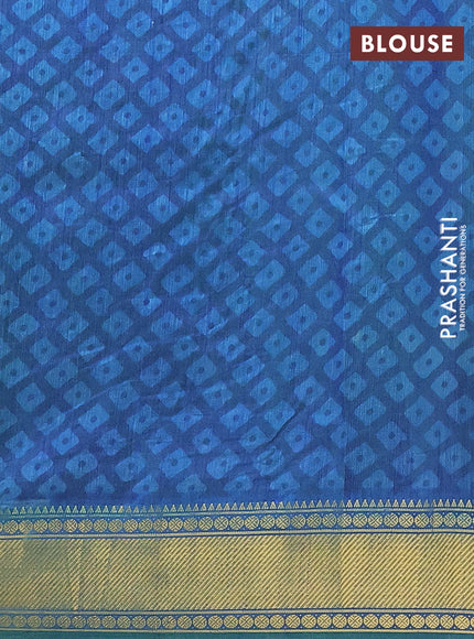 Semi tussar saree dual shade of teal blue and dark blue with allover ikat prints and zari woven border