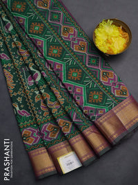 Semi tussar saree green with allover ikat prints and zari woven border