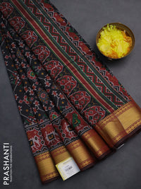 Semi tussar saree black and deep maroon with allover ikat prints and zari woven border