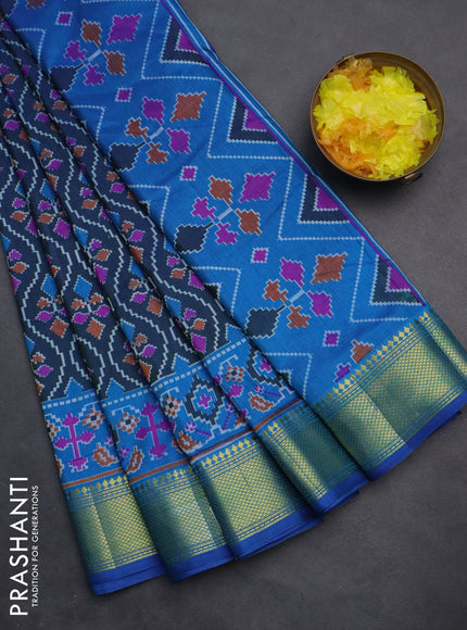 Semi tussar saree dual shade of bluish green and blue with allover ikat prints and zari woven border