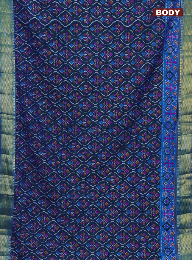 Semi tussar saree dual shade of bluish green and blue with allover ikat prints and zari woven border