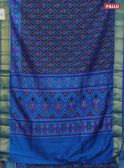 Semi tussar saree dual shade of bluish green and blue with allover ikat prints and zari woven border