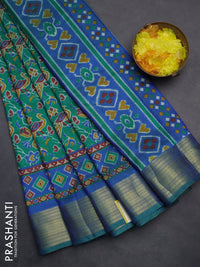 Semi tussar saree green and dual shade of blue with allover ikat prints and zari woven border