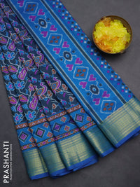 Semi tussar saree dual shade of bluish green and cs blue with allover ikat prints and zari woven border