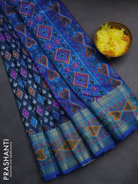 Semi tussar saree dual shade of bluish green and blue with allover ikat prints and zari woven border