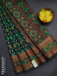 Semi tussar saree green and maroon with allover ikat prints and zari woven border
