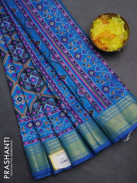 Semi tussar saree dual shade of bluish green and cs blue with allover ikat prints and zari woven border