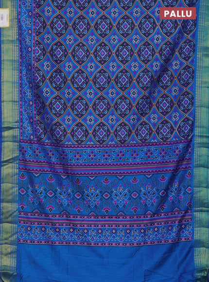 Semi tussar saree dual shade of bluish green and cs blue with allover ikat prints and zari woven border