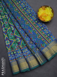 Semi tussar saree green and blue with allover ikat prints and zari woven border