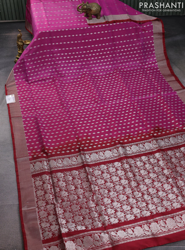Pure uppada silk saree magenta pink and maroon with allover silver zari woven buttas and silver zari woven border