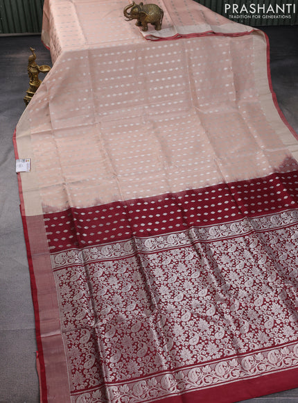 Pure uppada silk saree sandal and maroon with allover silver zari woven buttas and silver zari woven border