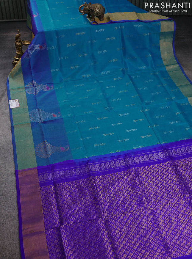 Pure uppada silk saree teal blue and blue with silver & gold zari woven buttas and peacock design zari woven border