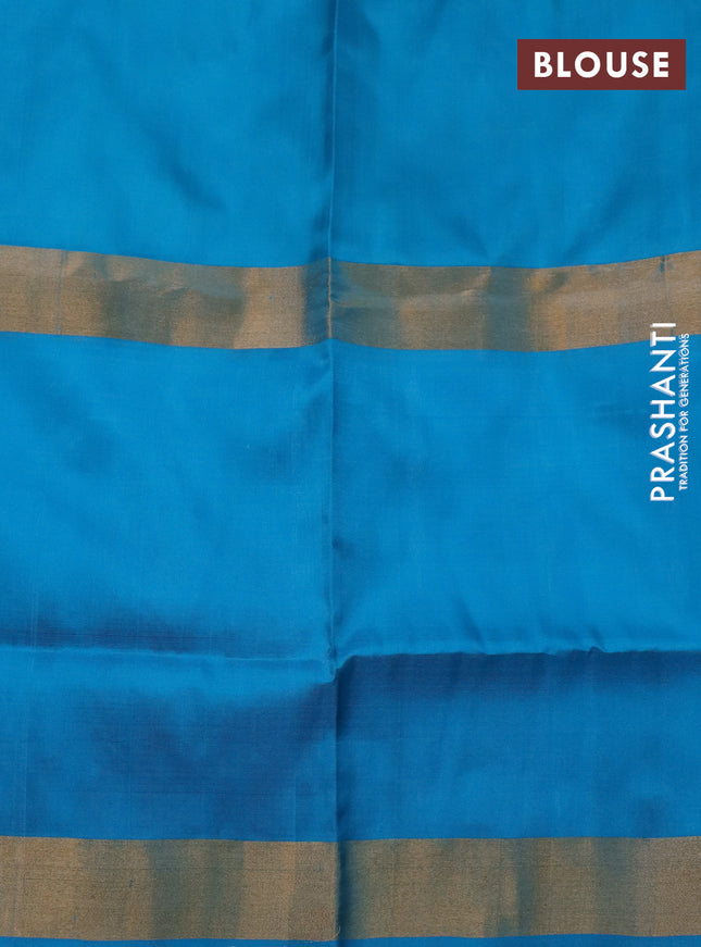 Pure uppada silk saree dual shade of green and cs blue with silver zari woven buttas and long zari woven border