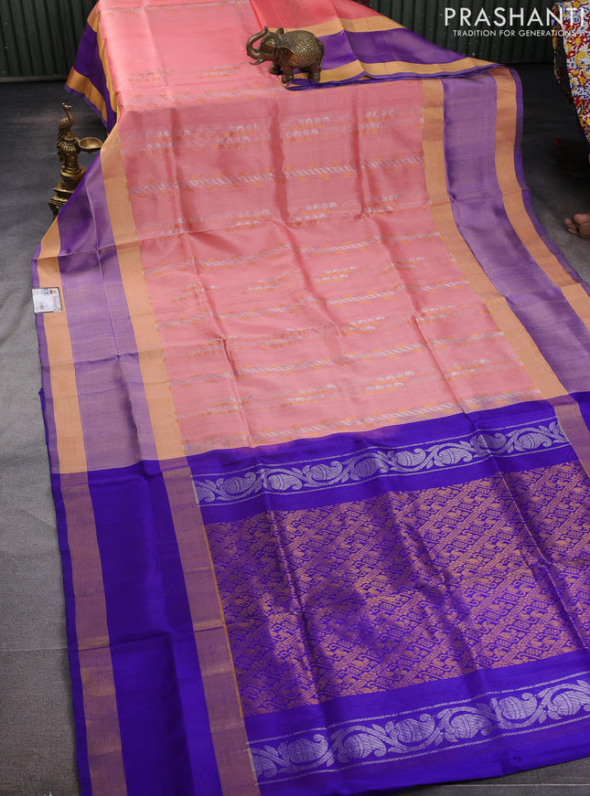 Pure uppada silk saree peach shade and blue with allover silver & gold zari weaves and rettapet zari woven border