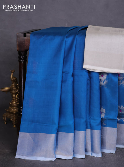 Pure uppada silk saree cs blue with silver zari woven floral buttas and silver zari woven border
