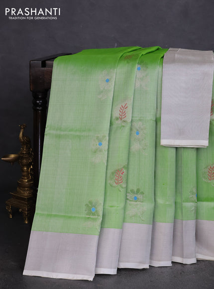 Pure uppada silk saree pista green with silver zari woven floral buttas and silver zari woven border